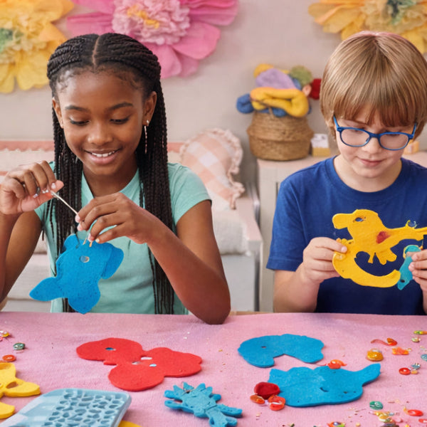 Children crafting around a table
